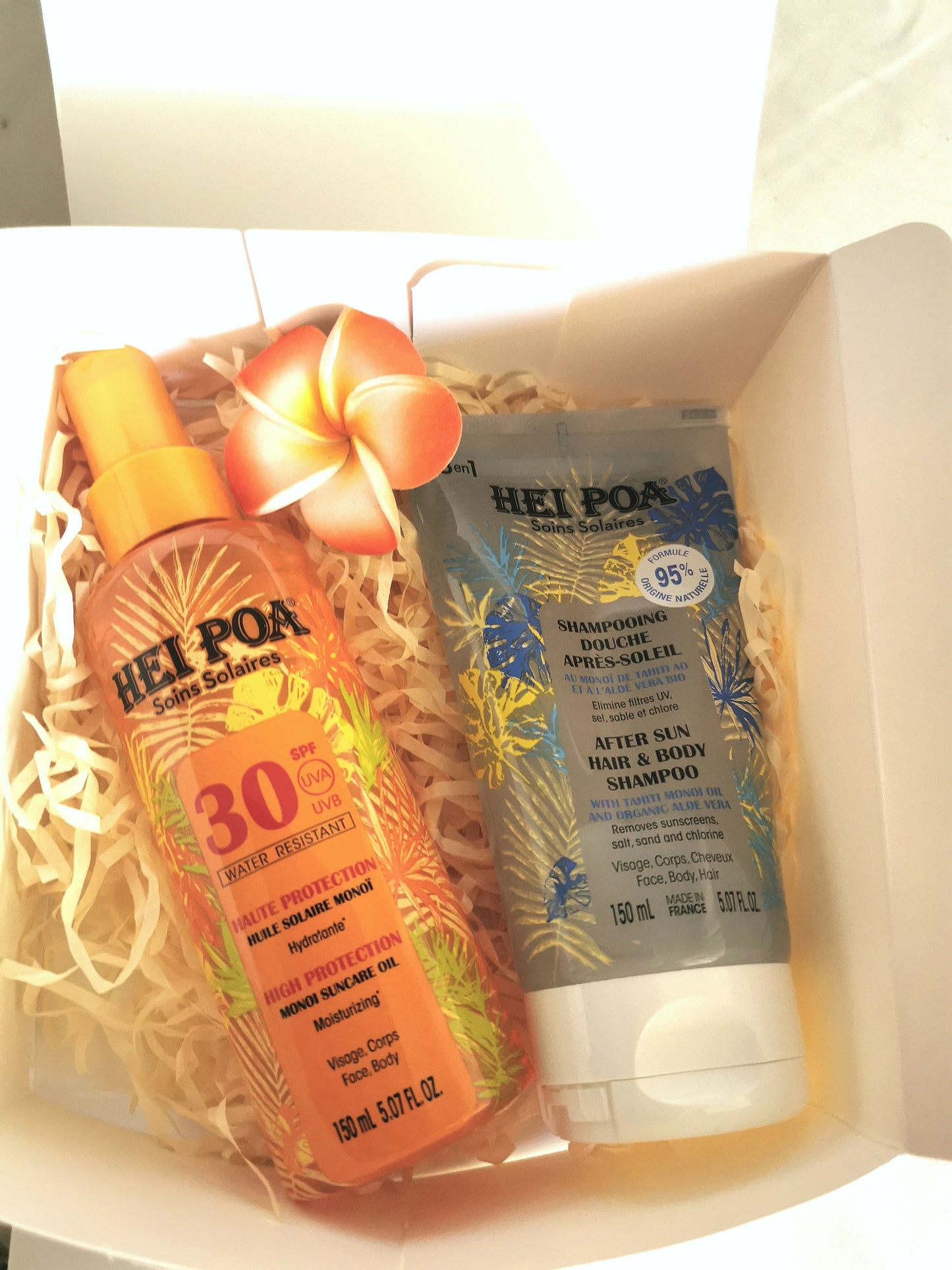 Duo Heï poa  Huile Solaire SPF30 et Shampoing gel douche après-soleil .